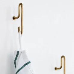 Moebe väggkrok small 2-pack Matt guld